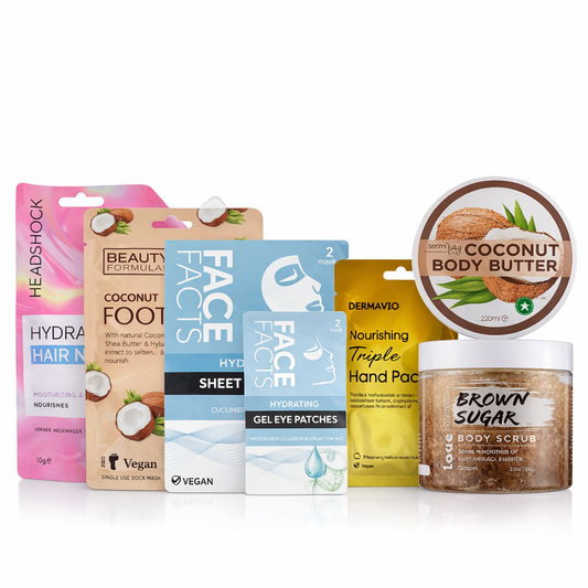 Coconut spa pamper gift set featuring body scrub, body butter, hair mask, face masks, eye patches and hand pack on white background
