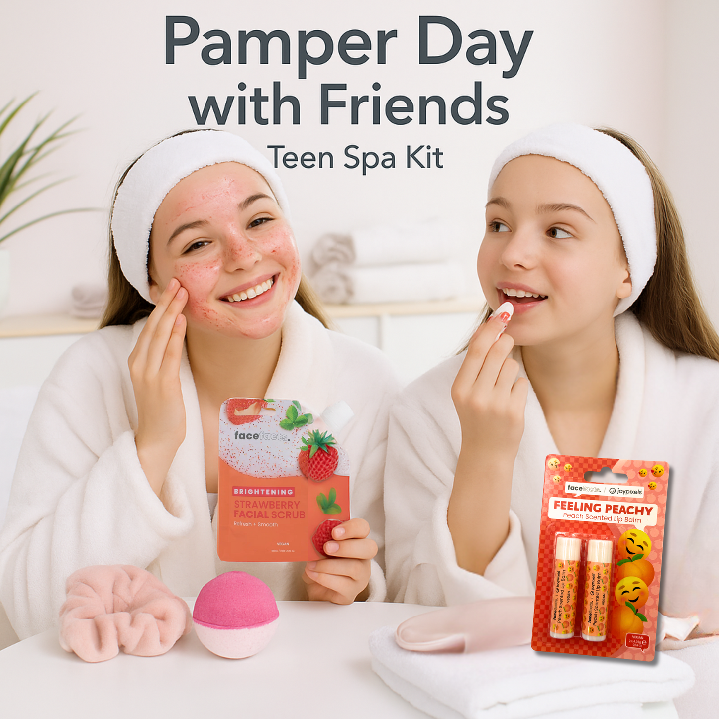 Two teen girls enjoying strawberry facial scrub and peach lip balm from self-care spa kit