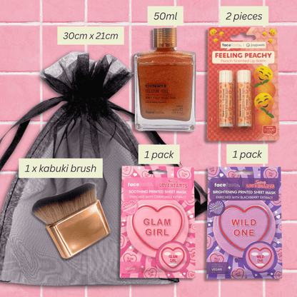 Peach glow gift set contents including shimmer glow oil, peach lip balm, kabuki brush, printed sheet masks and organza gift bag