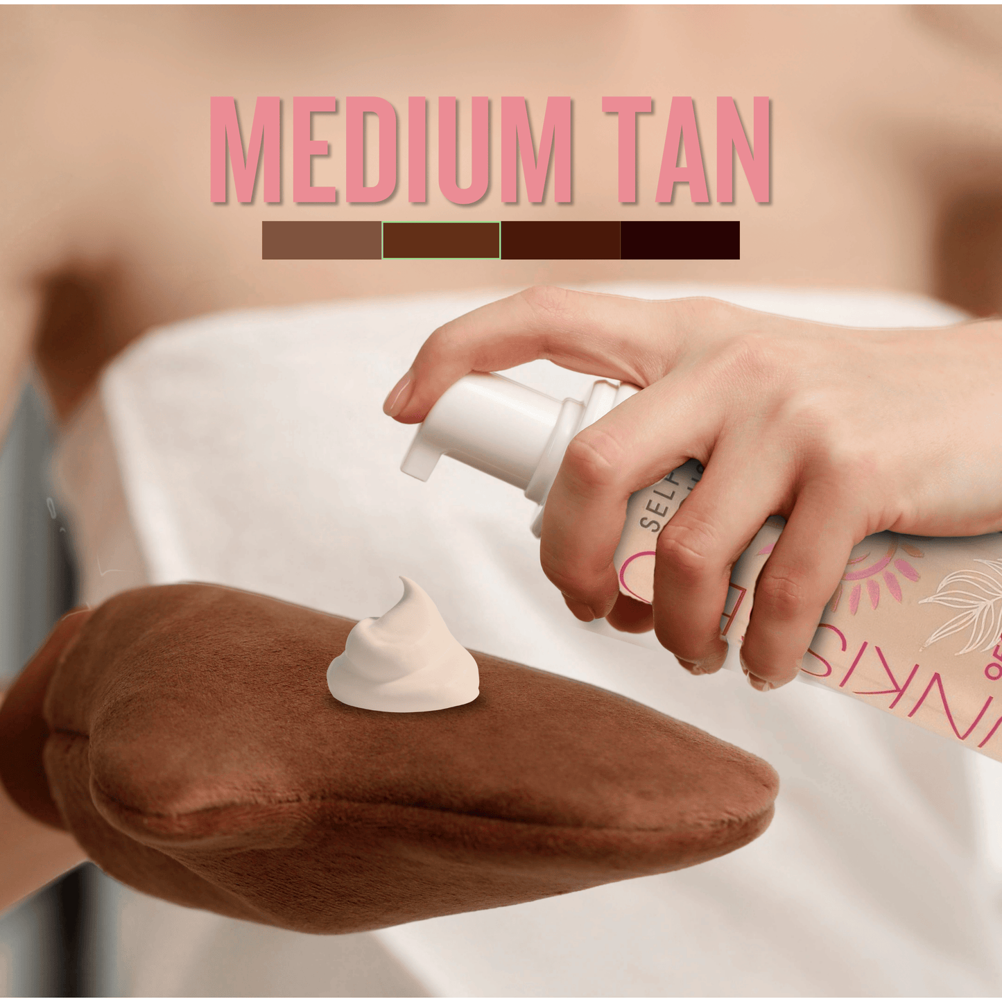 Medium self tan mousse applied onto tanning mitt showing creamy texture for even streak free tanning
