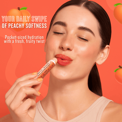 Woman applying peach scented lip balm for smooth hydrated lips