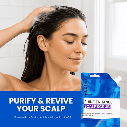 Woman applying Headshock shine enhance scalp scrub to wet hair during shower routine to exfoliate buildup and purify the scalp.
