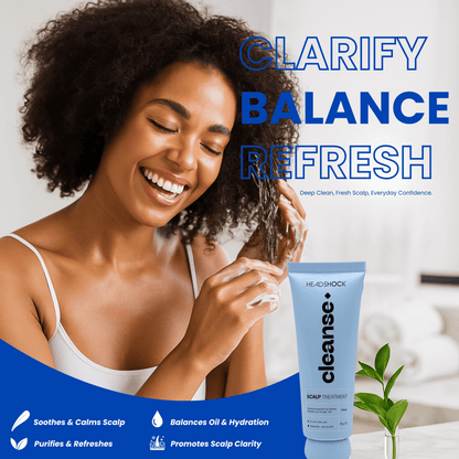 Model using Headshock cleanse scalp treatment to clarify the scalp, balance oil levels and support refreshed, healthy looking hair.