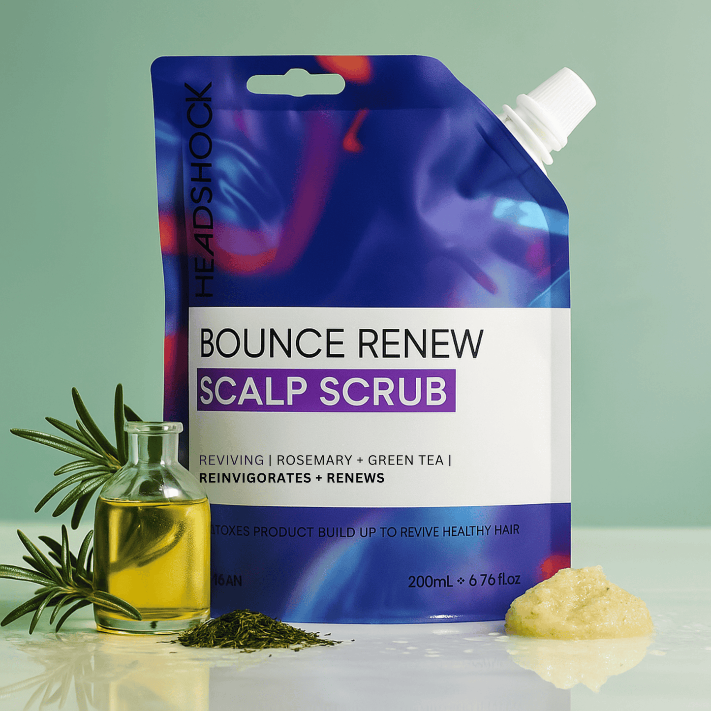 Headshock bounce renew scalp scrub with rosemary and green tea, designed to exfoliate buildup and refresh the scalp.