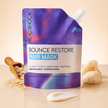 Headshock bounce restore hair mask with oats and shea butter shown to nourish, strengthen and smooth dry or frizzy hair.