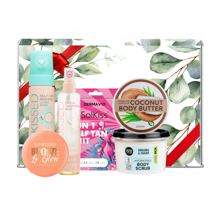Collection of self-tanning products including mousse, mist, and scrub presented in premium gift packaging suitable for all occasions, ideal for birthdays, Christmas, Mother’s Day and self-care gifting.