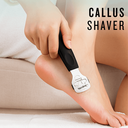 Callus shaver tool in action on heel, removing thick skin buildup with ergonomic grip, for home pedicure.