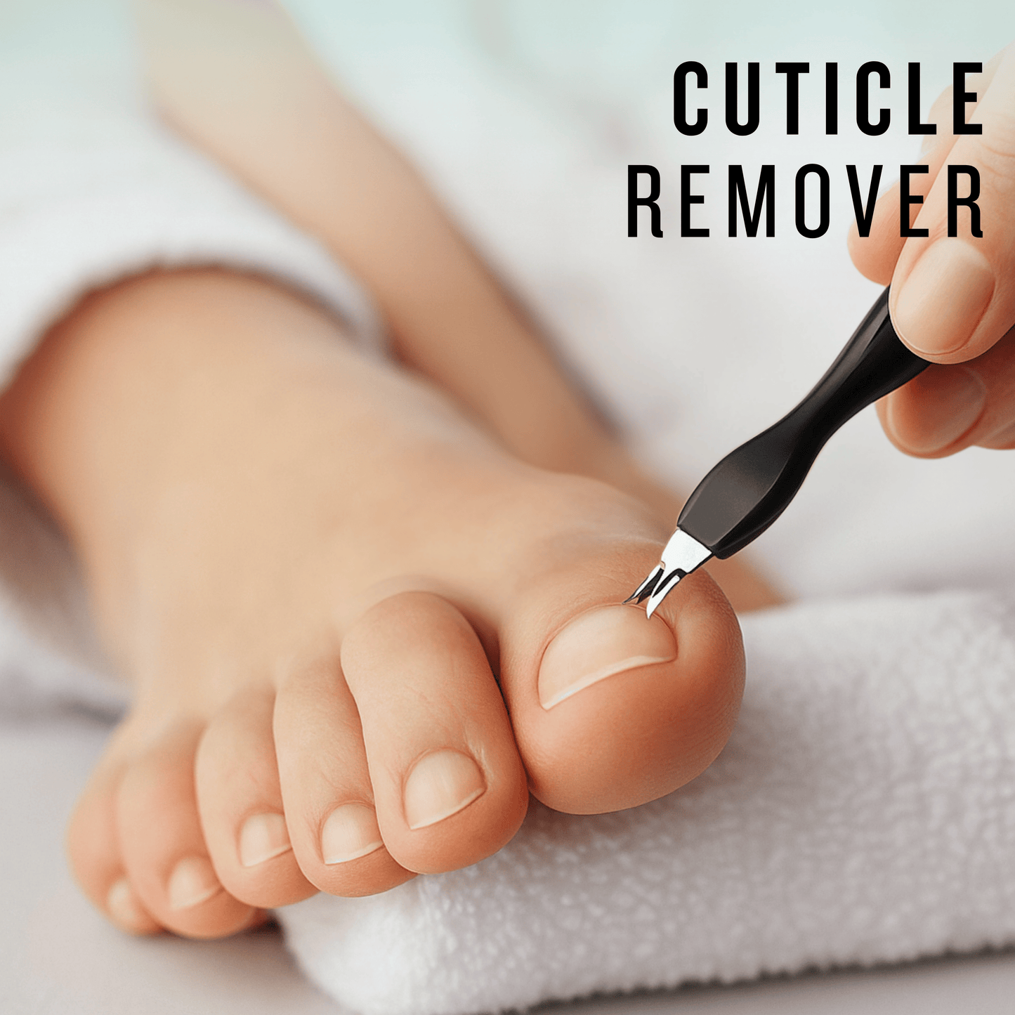 Precision cuticle remover tool on toenail, part of black pedicure kit, clean foot care closeup.