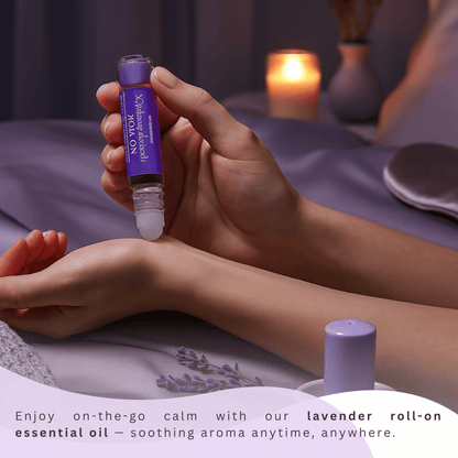 Lavender roll-on essential oil being applied to wrist, promoting calm and restful nighttime vibes