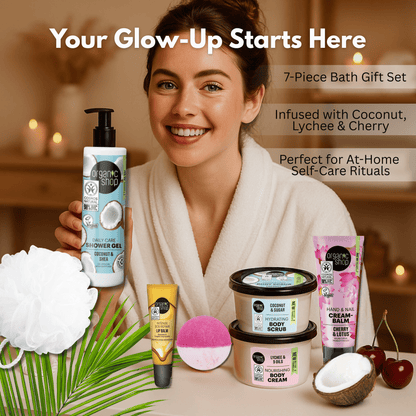 Woman smiling in robe with full bath gift set including shower gel, body cream, scrub, lip balm, and puff