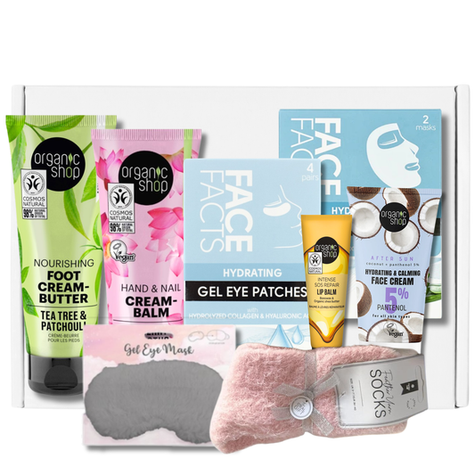Flat lay of self-care gift set with creams, masks, patches, and socks – perfect for relaxing pamper routines or gifting