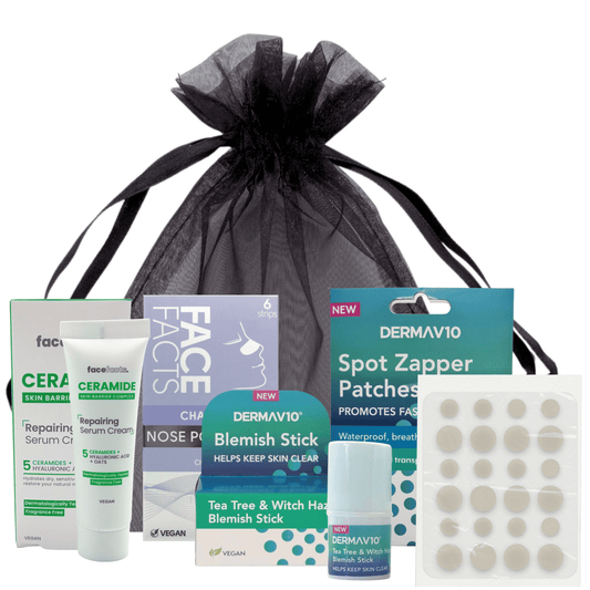 Flat lay of spot care kit contents in black organza bag, ideal skincare gift for teens and women